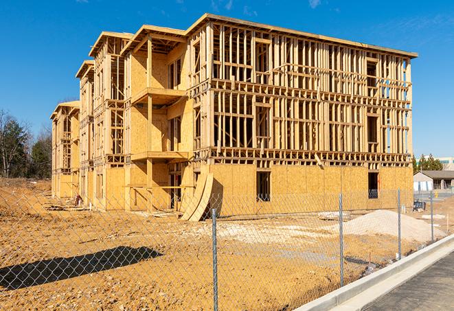 a mobile fence protecting a construction site and workers in Brawley